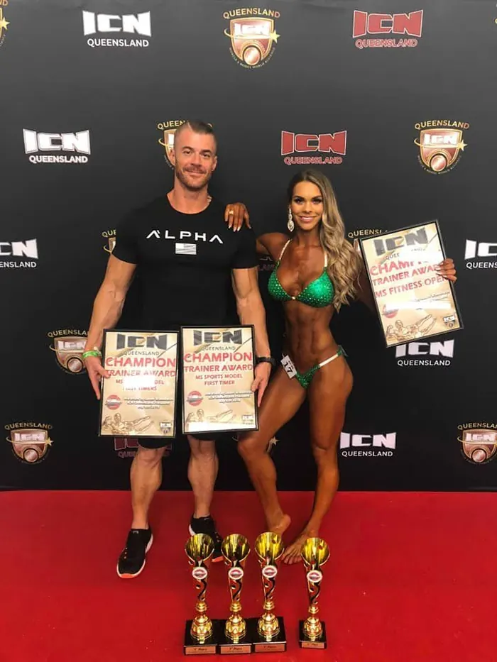Michael Lea with a bodybuilding competitor he coached
